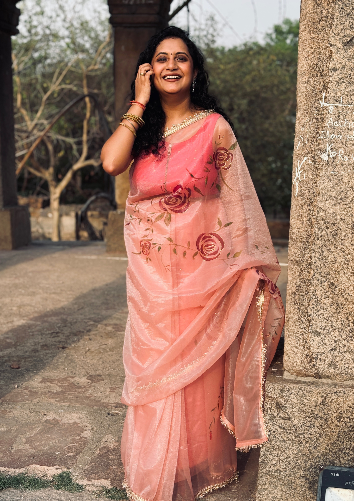 Malook Peach Shining Nylon net Hand-Painted saree with Red Rose Motifs
